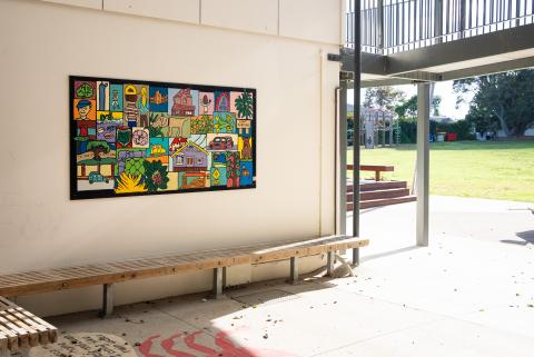 a mural on the wall of a classroom